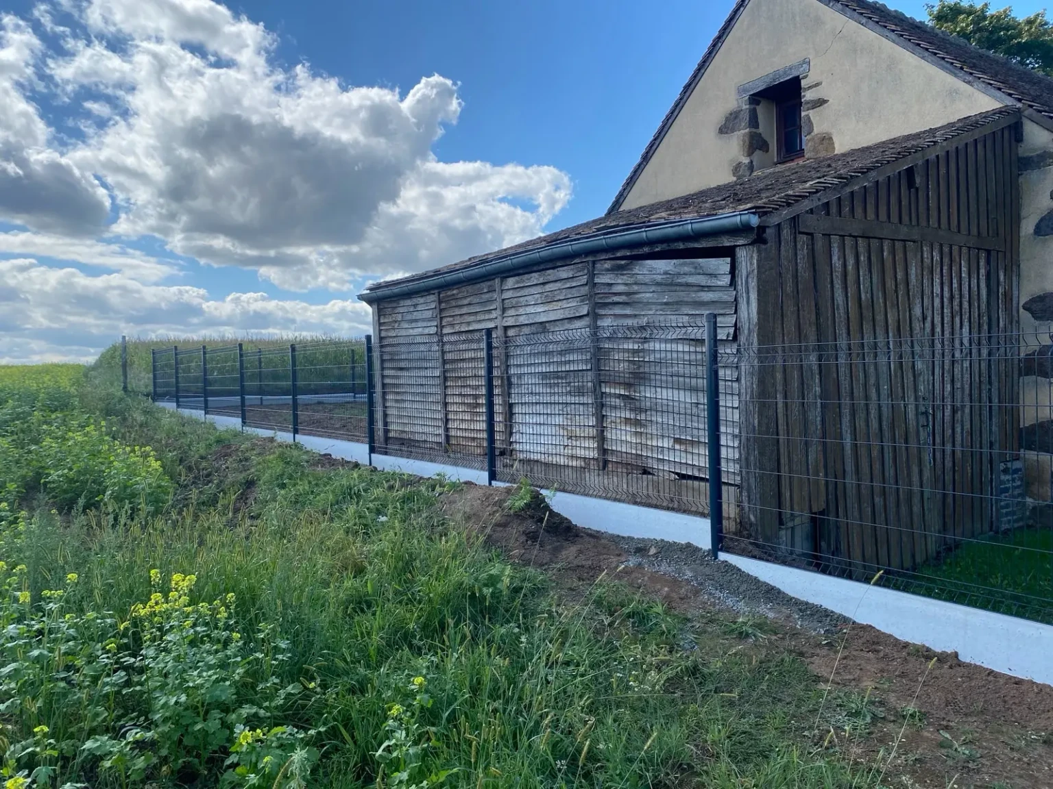 Entreprise soubassement béton pour clôture au Mans et dans les Pays de la Loire